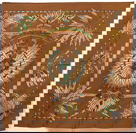 Hermes 'Brazil' Silk Scarf: Hermes 'Brazil' silk scarf was designed by Laurence Bourthoumieux in 1988 and features a tribal motif with feathers, Hermes tag, 'Hermes Paris' in the center and hand rolled edges. Measures 35"x 35".