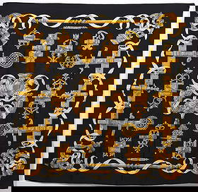 Hermes 'Ferronnerie' Silk Scarf: Hermes 'Ferronnerie' silk scarf designed by Cathy Latham, 1970's, has hand rolled edges. It is gold and white on black ground, signed Hermes and has a Hermes label. Measures 35" x 35" and is in good c