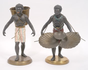 Two Painted Tole Blackamoor Figures on Brass