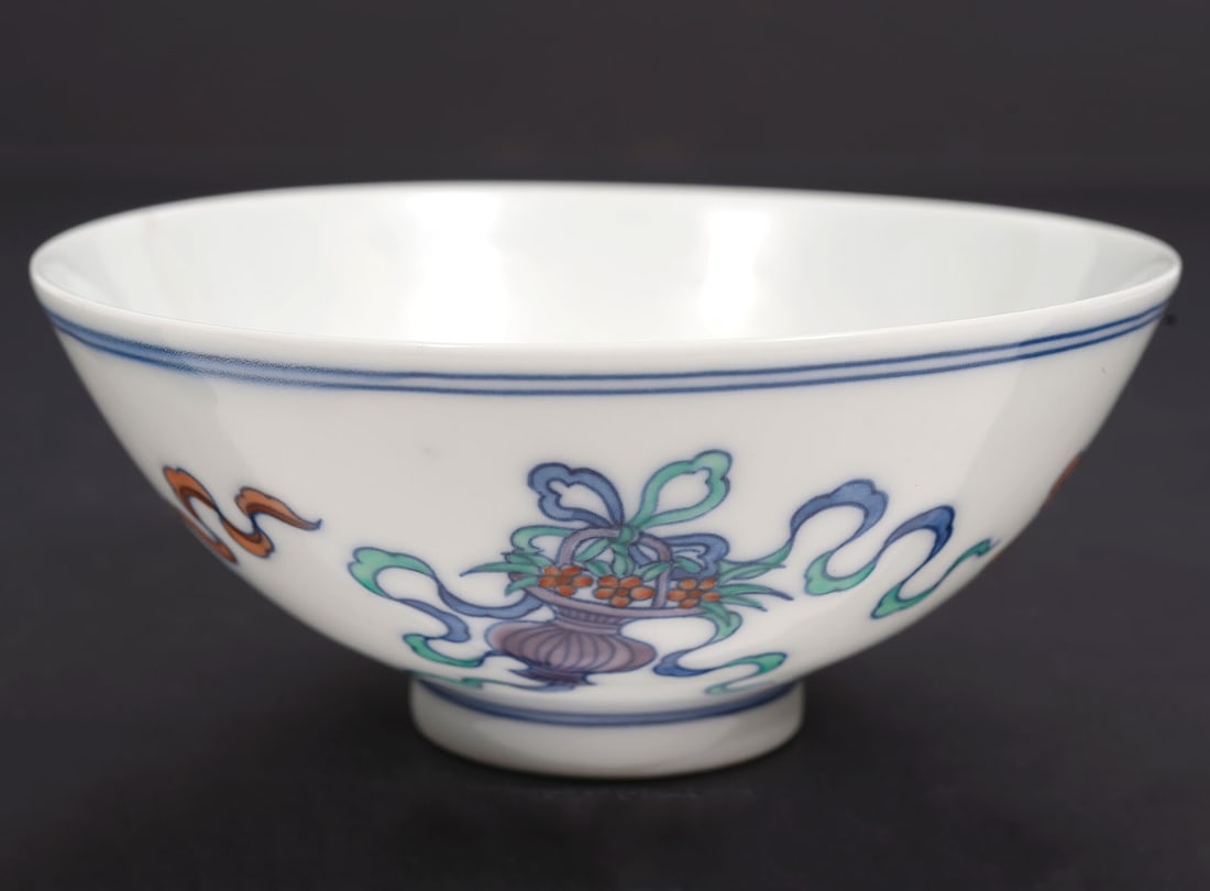 Chinese Porcelain Small Bowl with Mark: Hand painted porcelain Chinese bowl marked on underside. Measures 3.75" W x 1.5" H. Condition report: good with no visible issues. Contact C. Biddle Auction Gallery for more detailed information. C. B