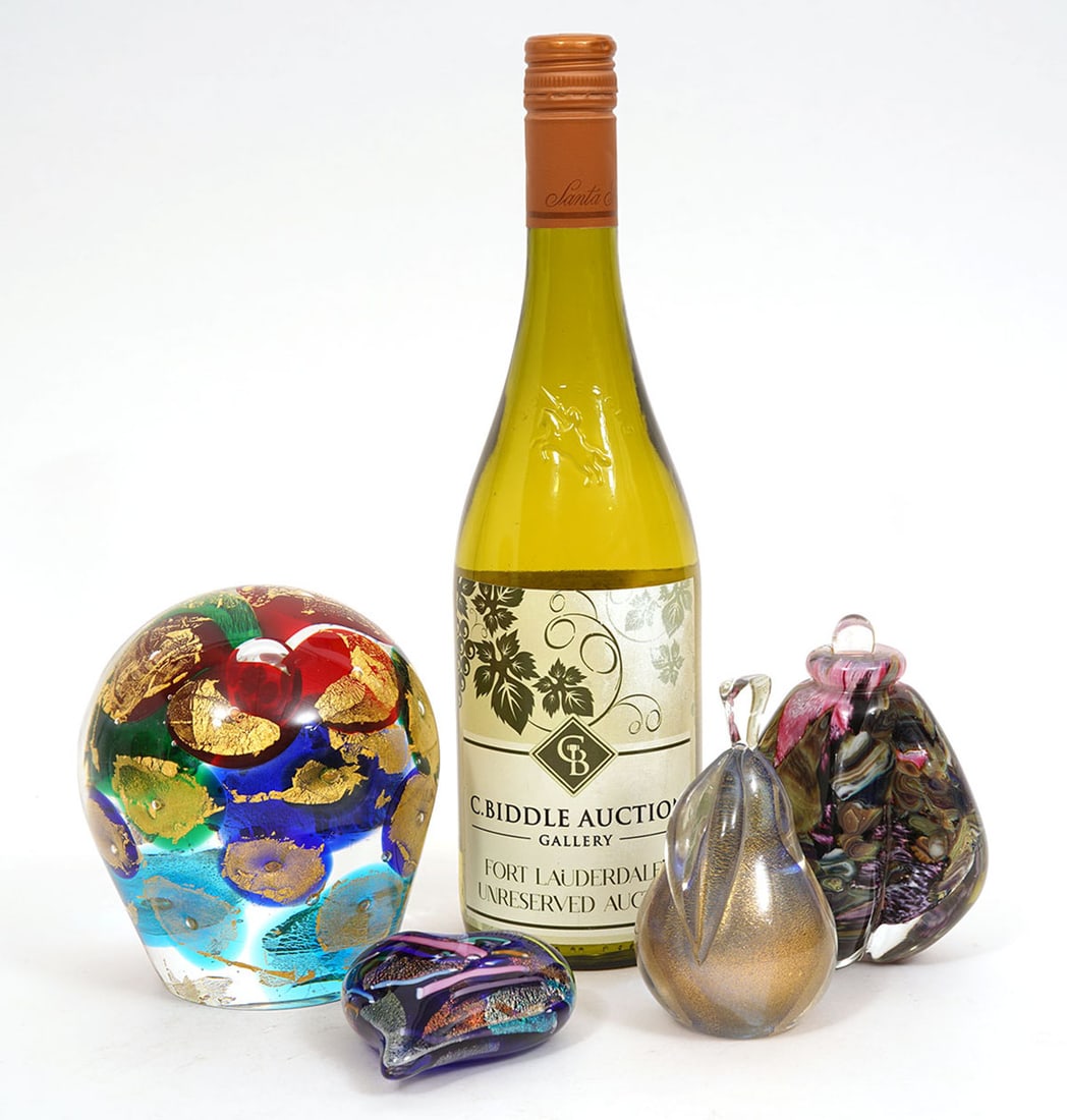 Four Assorted Art Glass Paperweights: Four art glass paperweights with gold flecks, red and blue confetti with layers of colored glass encased in clear glass includes a heart (3.25"H x 2.75"W x 1.25"D) with a 'Glass Eye' label; globular s