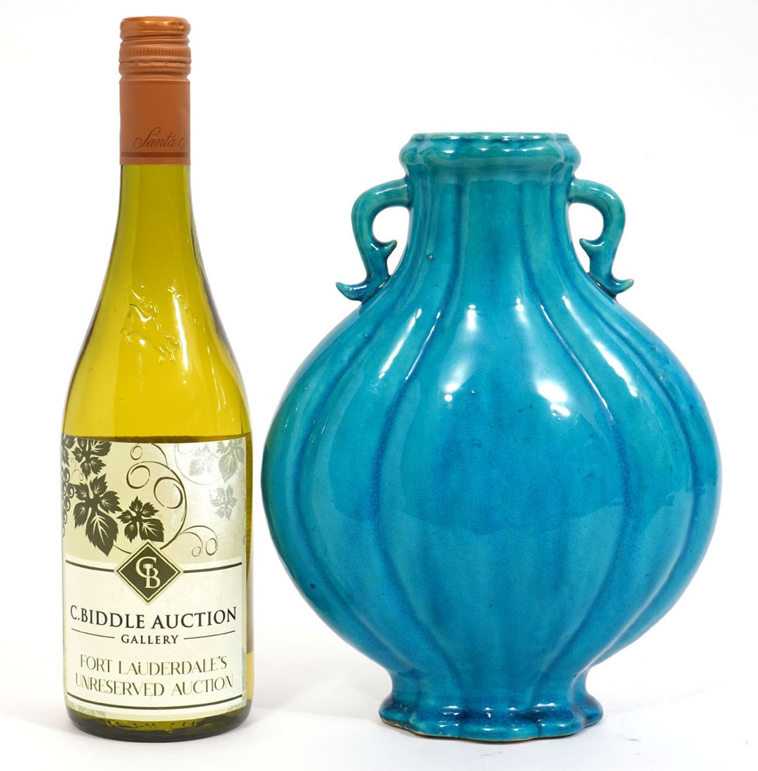 Vintage Turquoise Ceramic Moon Flask Vase: Vintage lobed hu-form moon flask vase with archaistic handles in vibrant turquoise blue glaze. Measures 10"H x 7.25"W x 4"D. Condition report: good condition, please see all photos. Contact C. Biddle