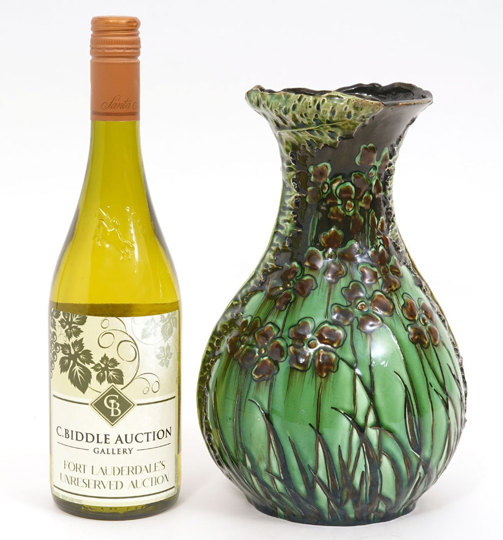 Ernst Wahliss Art Nouveau Glazed Ceramic Vase: Ernst Wahliss, Austria (1837-1900). Art Nouveau slip glazed ceramic vase with a green ground and raised floral decorations was manufactured by Austrian based Turn-Wien and is marked on underside. Meas