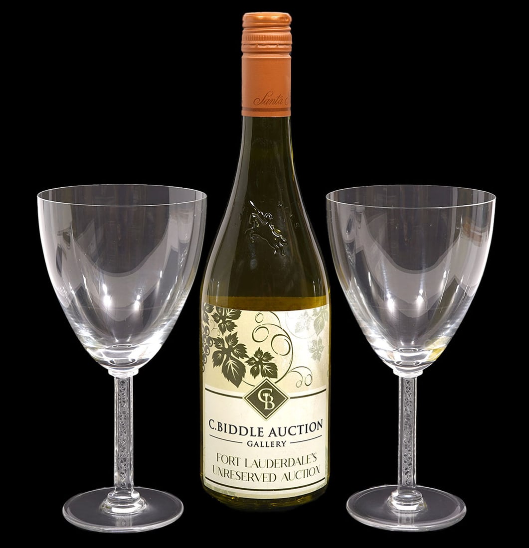 Two Lalique "Phalsbourg" Crystal Water Goblets: Two Lalique "Phalsbourg" crystal water goblets, each measures approximately 7.75"H. Condition report: Good condition, please examine all photos closely. Contact C. Biddle Auction Gallery for more deta