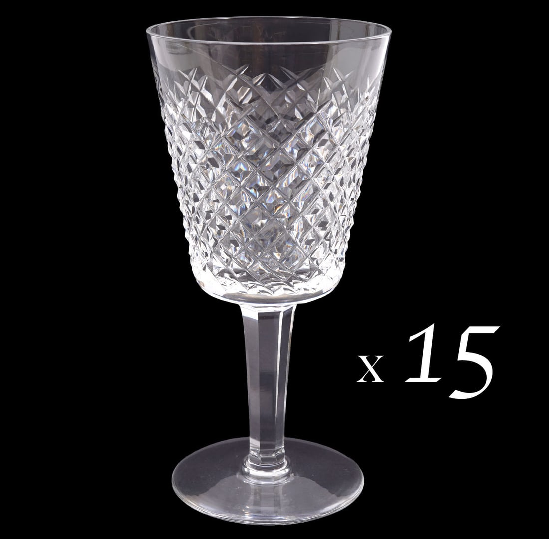 15 Waterford Crystal 'Alana' Water Goblets: 15 Waterford crystal water goblets in 'Alana' pattern with 'Waterford' stamp on underside of each. Measures 6.75"H x 3"W base. Condition report: good condition, please see all photos. Contact C. Biddl
