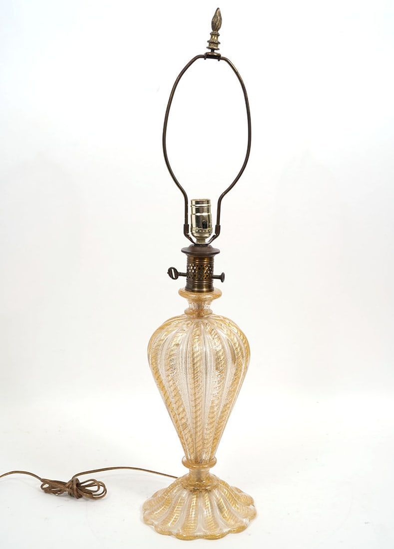 Murano Art Glass Gold Flecked Desk Lamp: Murano art glass gold flecked desk lamp with single socket and swirled glass body. Measures 33"H to top of finial; 20.5"H to top of socket; 6"W center and 7"W base. Condition report: good condition, p