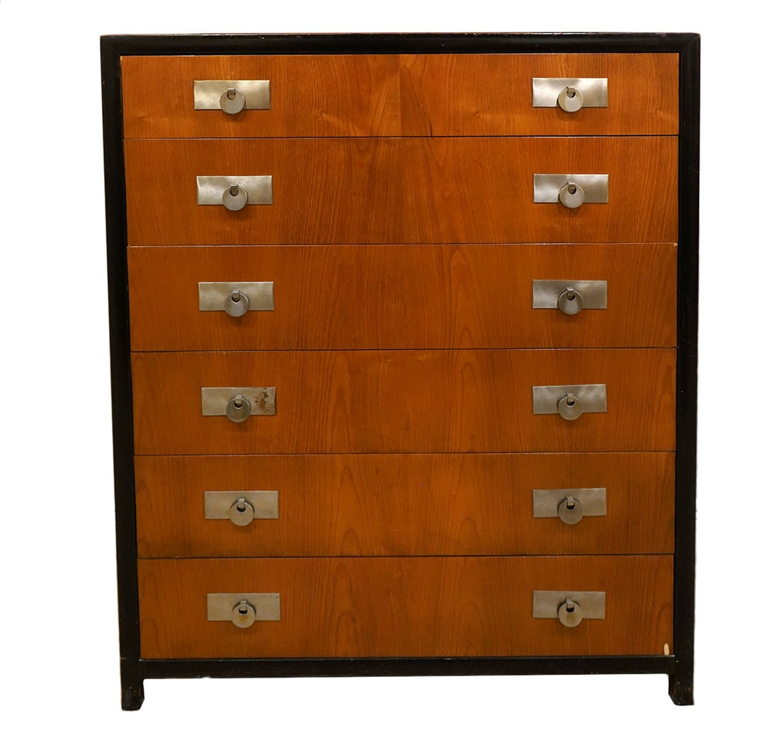 Michael Taylor for Baker Furniture High Chest: Michael Taylor for Baker Furniture walnut high chest with 6 drawers has metal ring handles and dark stained frame. 'Baker Furniture' metal tag inside top drawer. Measures 46.75"H x 19"D x 38"L. Condit