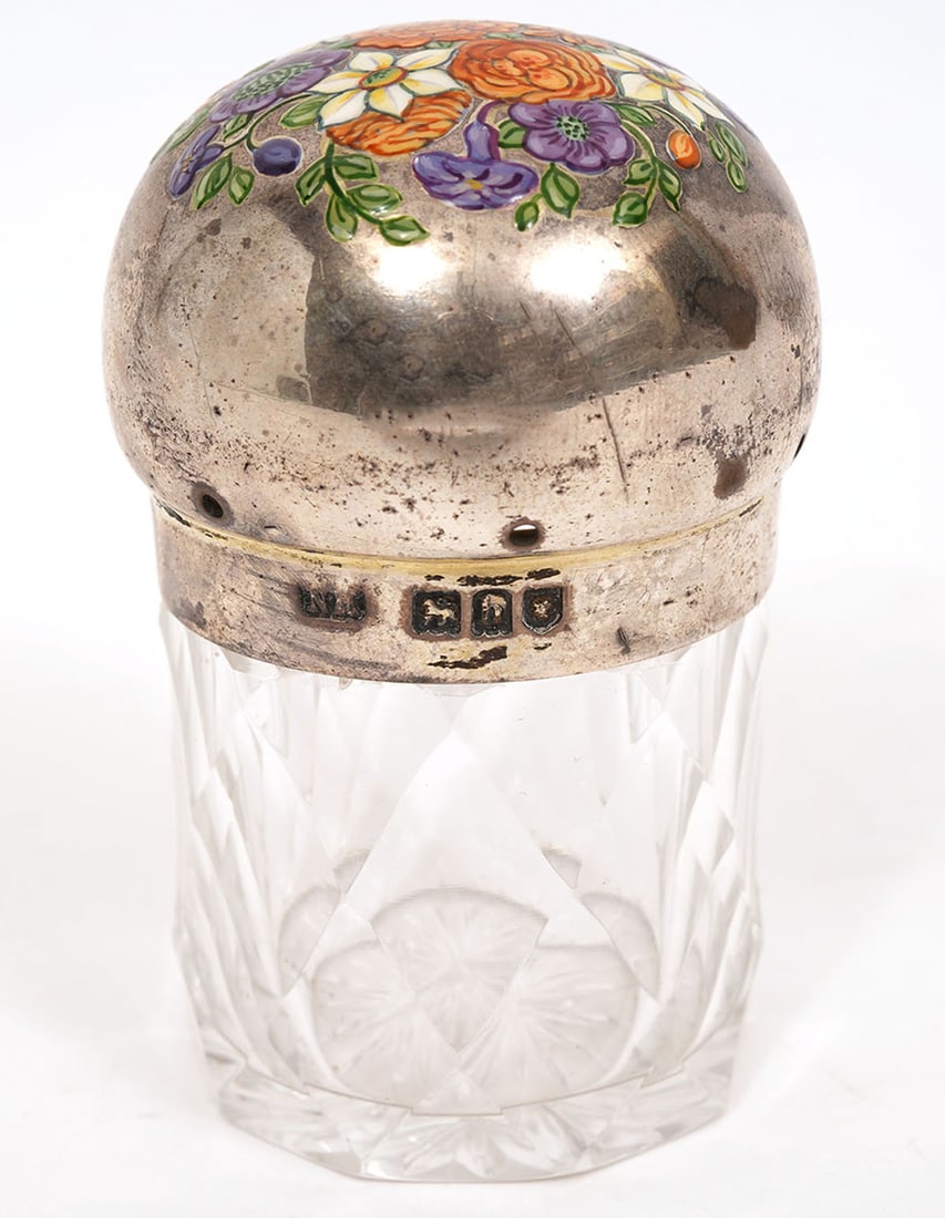 English Enameled Cut Glass Jar Sterling Lid: English 1903 cut glass jar with sterling dome shaped lid decorated with hand enameled flowers. The lid has worn hallmarks on the rim. This piece measures 2.5"H x 1.5"W. Condition report: wear commensu