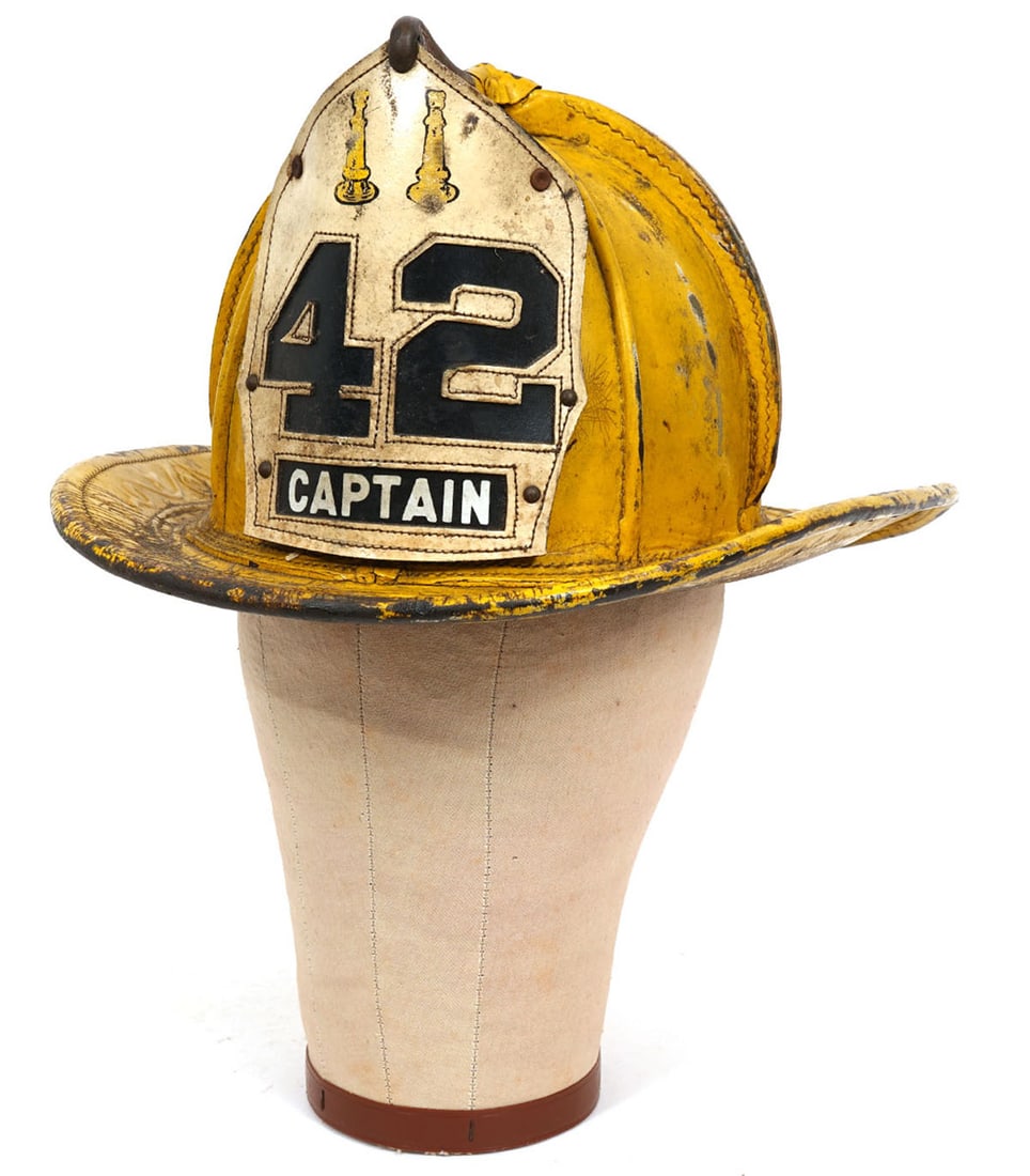 Fireman Captain's Hat Cairnes & Brothers NJ: Fireman Captain's hat #42 made by Cairnes & Brothers, New Jersey, measures 15"L x 12"W x 6.5"H. Condition report: Wear commensurate for age and use, please examine all photos closely. Contact C. Biddl