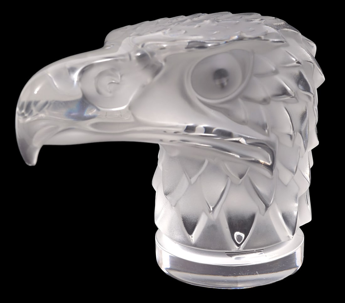 Lalique France Crystal Eagle Head Paperweight: Lalique France crystal eagle head paperweight is signed underside. Measures 5.5"L x 3.5"W x 4.5"H. Condition report: Very minor flea bite to end of beak, please examine all photos closely. Contact C.