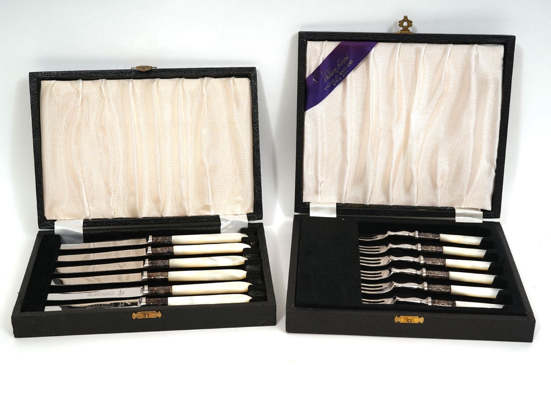 William Adams Silver-Plate & MOP Knives & Forks: William Adams silver-plate and mother-of-pearl knives (set of six, 7" L) and forks (set of six, 5.5"L). Each set in original presentation boxes. Condition report: Good condition, please examine all ph