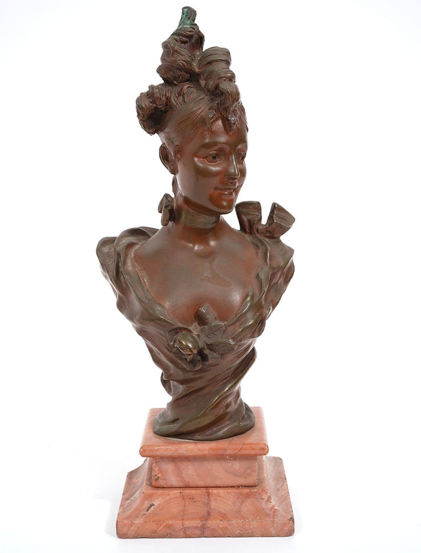 Victor Bruyneel Petite Bronze Bust: Victor Leopold Bruyneel, Belgium (Born 1859). Petite female bronze bust on pink marble base, signed on side. Measures 3.5"L x 4"W x 10.5"H. Condition report: Chip to base, please examine all photos cl