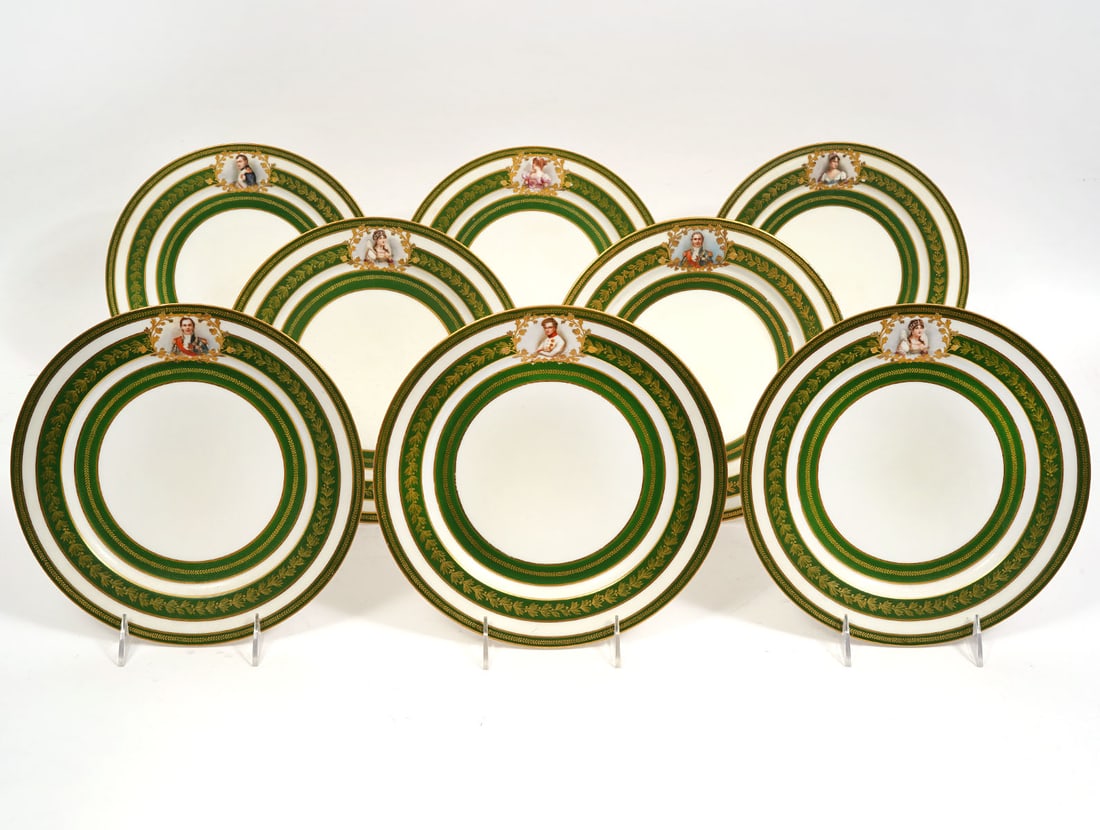 8 Limoges France Porcelain Plates: 8 Limoges France porcelain plates with double factory marks on underside. They have gilt and green laurel leaf borders and each plate has an individual portrait framed in a gilt vignette on the rim. M