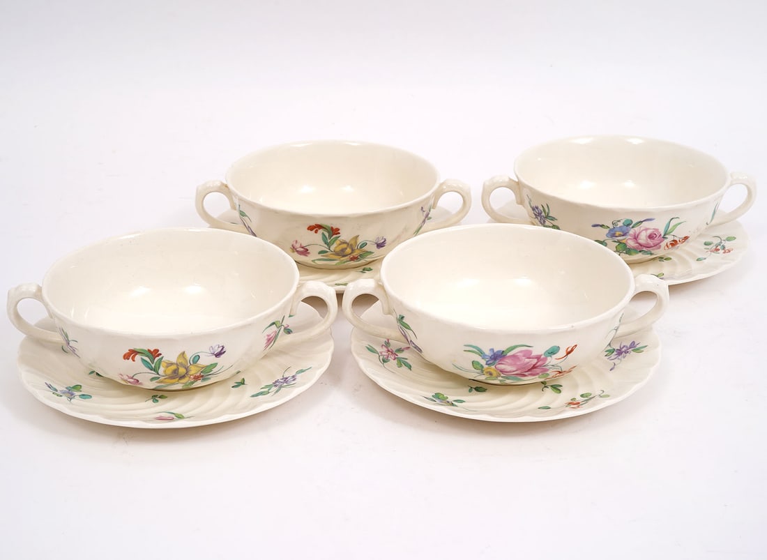 8 Pcs Old Bristol Porcelain Reproduction: 8 pieces of Clarice Cliff Reproduction Olde Bristol Porcelain designed by Duvivier includes 4 soup bowls with double handles and 4 saucers, all marked on underside. Bowls measure 6.25"W with handles x