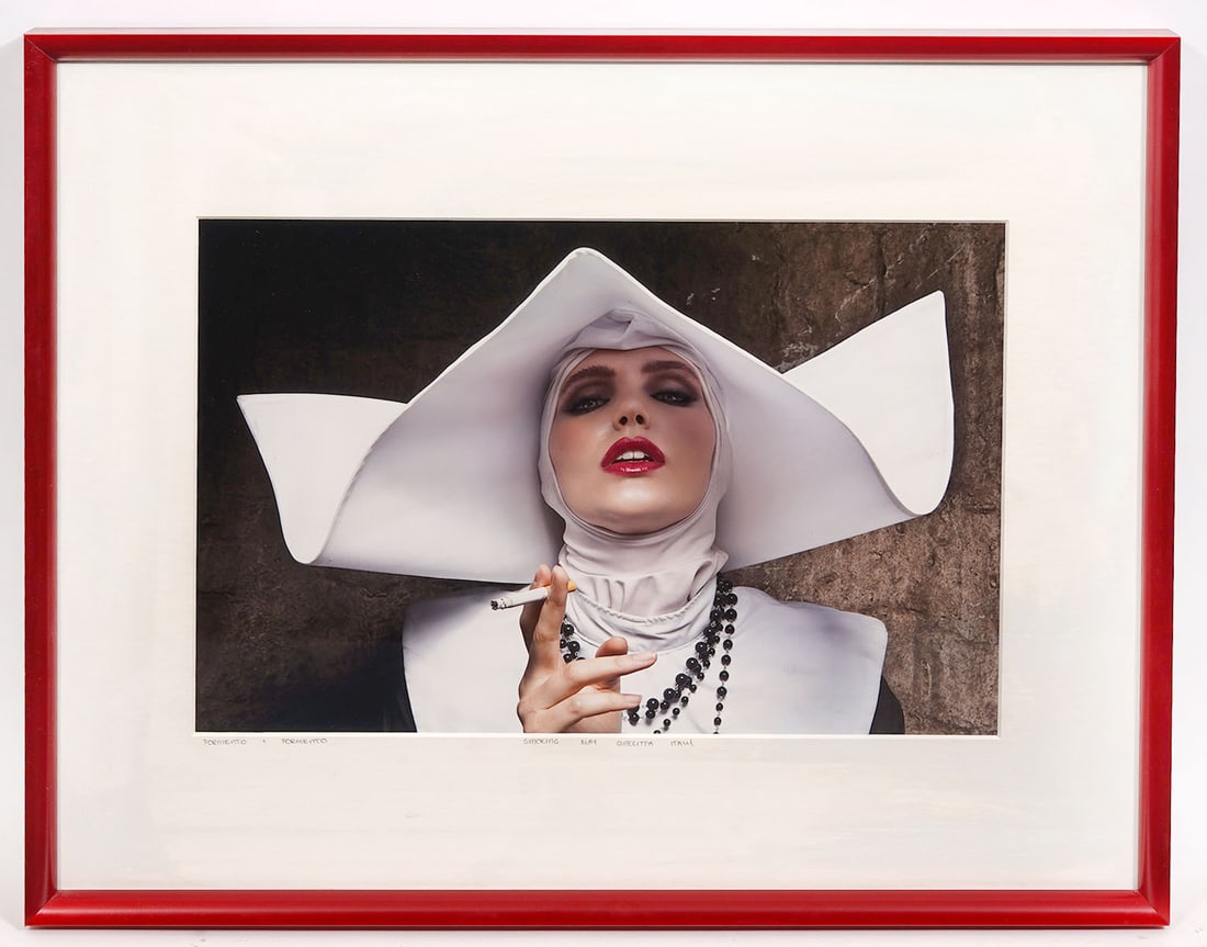 Formento + Formento Smoking Nun Photograph: Formento + Formento, "Smoking Nun Cinecitta Italy" photograph framed. Document on verso, photo numbered 4382. Measurements: Visual - 9"H x 13.5"W; Framed - 15.5"H x 19.5"W. Condition report: Good cond