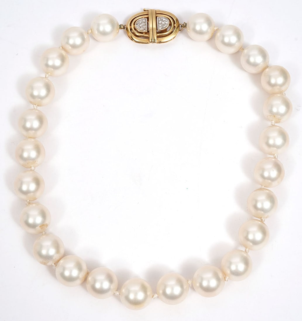 Faux Pearls 14K Diamond Pave Clasp Necklace: 14K yellow gold diamond pave accented clasp adorned with a 18" strand of 14mm each faux lustrous pearls. 14K gold mark stamped on box clasp. Condition report: Good condition, please examine all photos