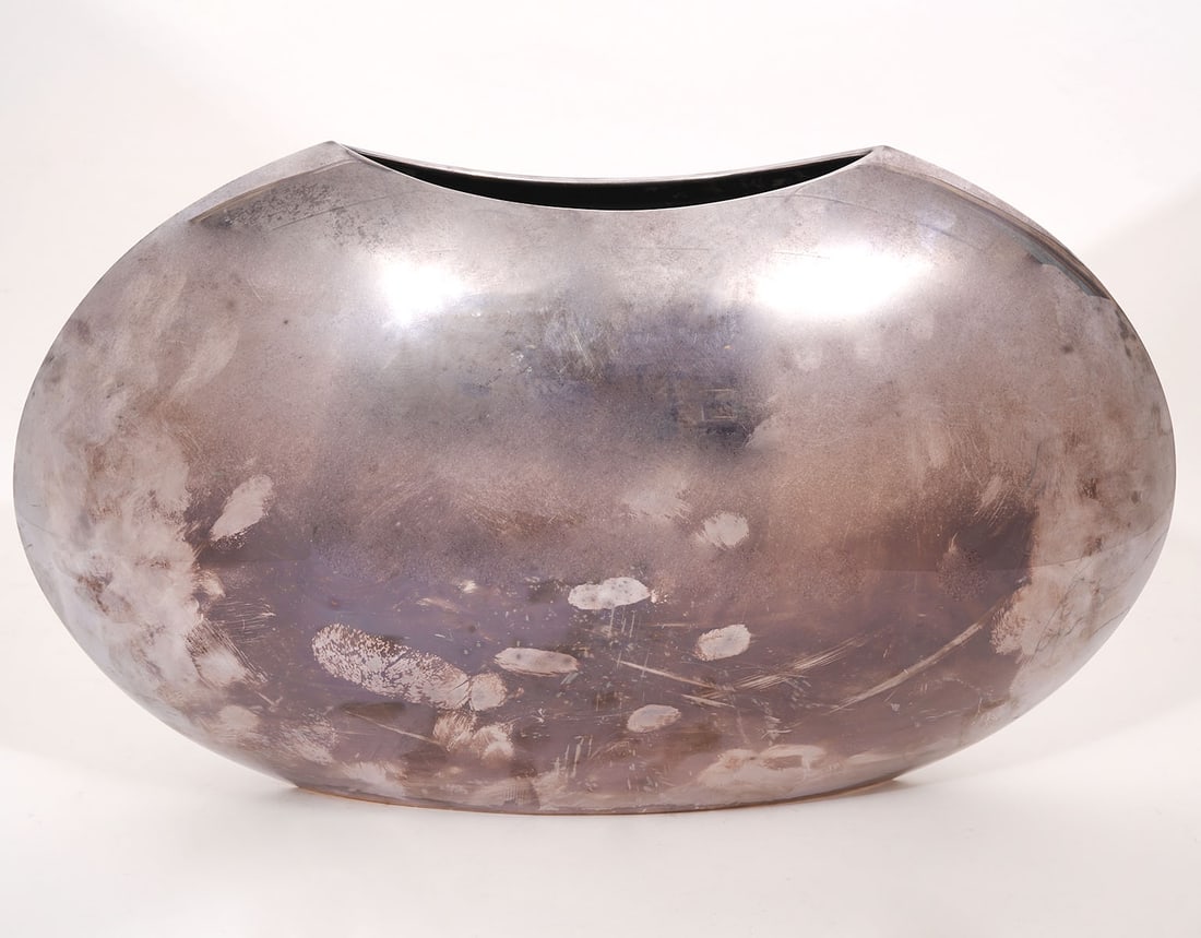 Sabatini Italy "SIN" Silver-Plate Metal Ovoid Vase: Lino Sabatini Italy "SIN" silver-plate ovoid vase, hallmarked underside. Measures 11.5"H x 20"L x 6.5"W. Condition report: Good condition, please examine all photos closely. Contact C. Biddle Auction