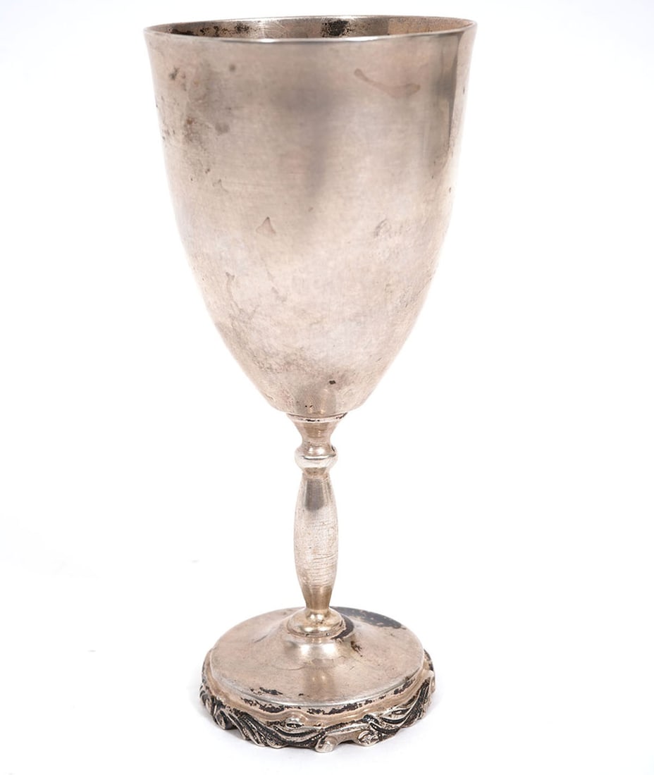 Mexican Sterling Silver Goblet: Mexican sterling silver goblet, stamped underside. Measures 6"H x 2.75"W. Weight - 206.2g. Condition report: Good condition, please examine all photos closely. Contact C. Biddle Auction Gallery for mo