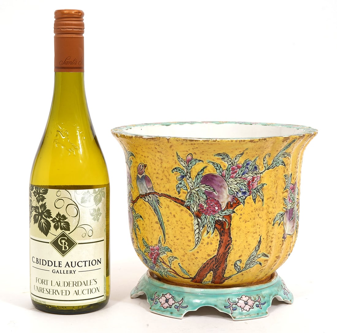 Chinese Birds & Fruits Porcelain Signed Jardiniere: Chinese porcelain jardiniere with hand-painted decoration of birds and pomegranate fruits on circular stand with red square signature underside. Measures 7"H x 8.25"W. Condition report: Minor surface