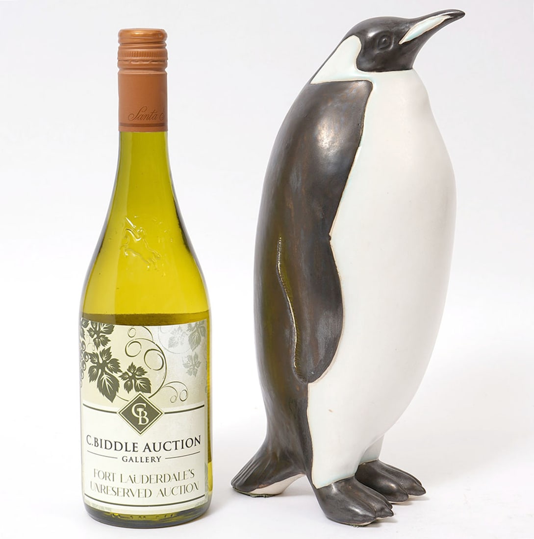 Weston Neil Andersen Emperor Penguin Figurine: Weston Neil Andersen, American (1922-2015). Art pottery figurine of an Emperor Penguin has a matt black finish and incised 'AD' on bottom, Andersen Design Studio. Measures 12"H x 5"D x 4.5"W. Conditio