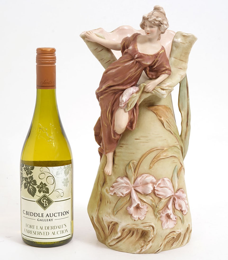 Royal Dux Art Nouveau Figural Porcelain Vase: Royal Dux Art Nouveau porcelain vase features a woman resting on a flowing tree and is hallmarked underside. Measures 14"H x 6"W. Condition report: Good condition, please examine all photos closely.