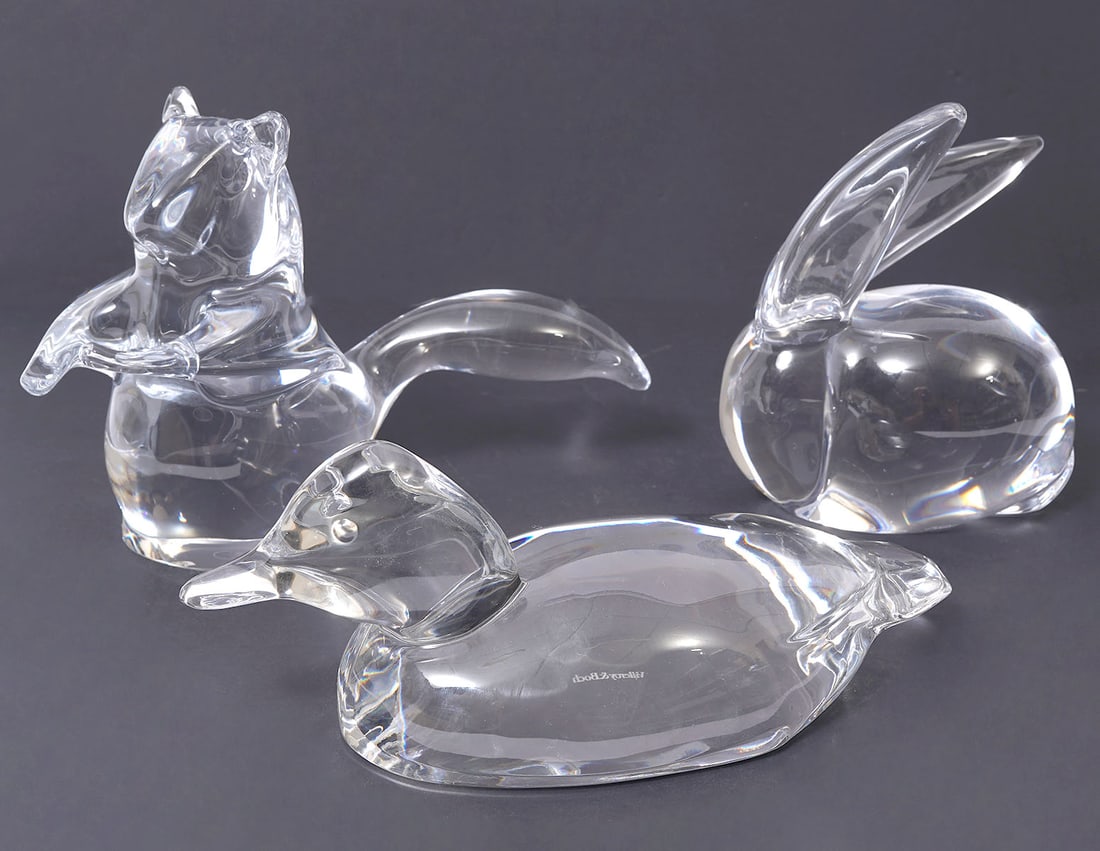 Three Signed Crystal Animal Figurines: Three signed crystal animal figures includes a Villeroy & Boch duck (9"L x 4"W x 4"H), Daum rabbit (5"L x 3"W x 6"H), Daum squirrel (9"L x 4.5"W x 6"H). Each piece is signed. Condition report: Good co