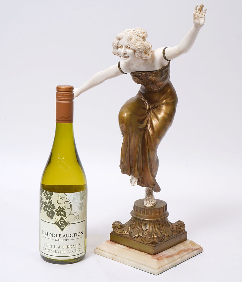Signed Art Deco Bronze and Composite Sculpture: Art Deco bronze and composite sculpture of a female dancer mounted on a carved marble and bronze base, illegibly signed behind one foot. Measures 17.5"H x 11.5"W x 5"D. Condition report: good conditio