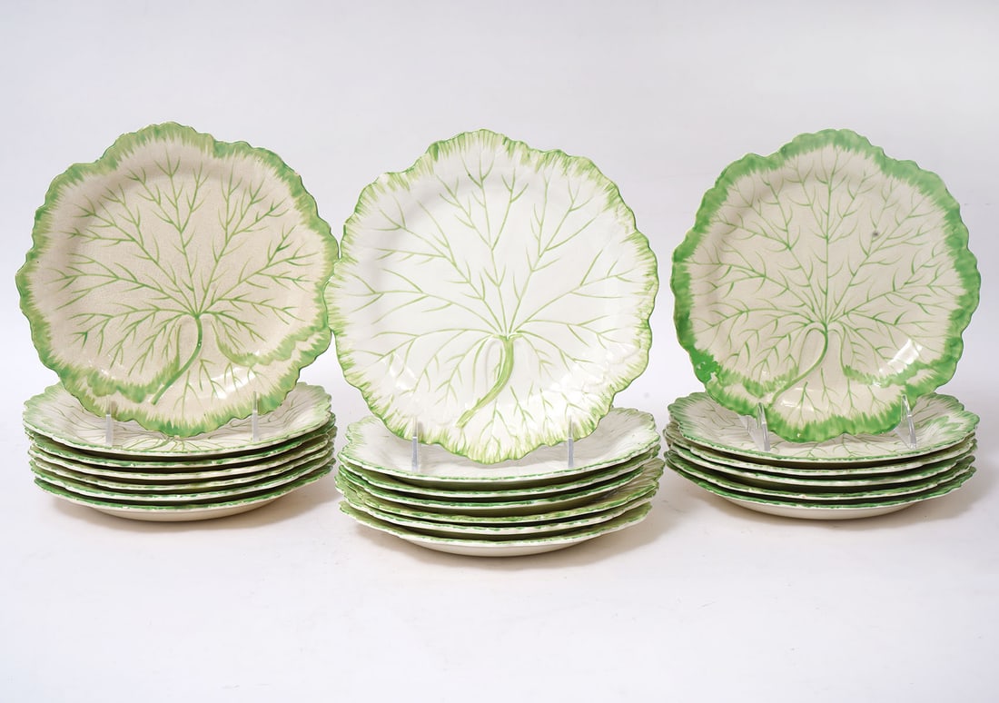 20 WH Grindley & Co. Leaf Pattern Plates: 20 WH Grindley & Co. vintage leaf pattern plates with hand painted green highlights on edges and veins. Measures 8"W. Condition report: some plates show wear to surfaces, 3 have small chips, please se