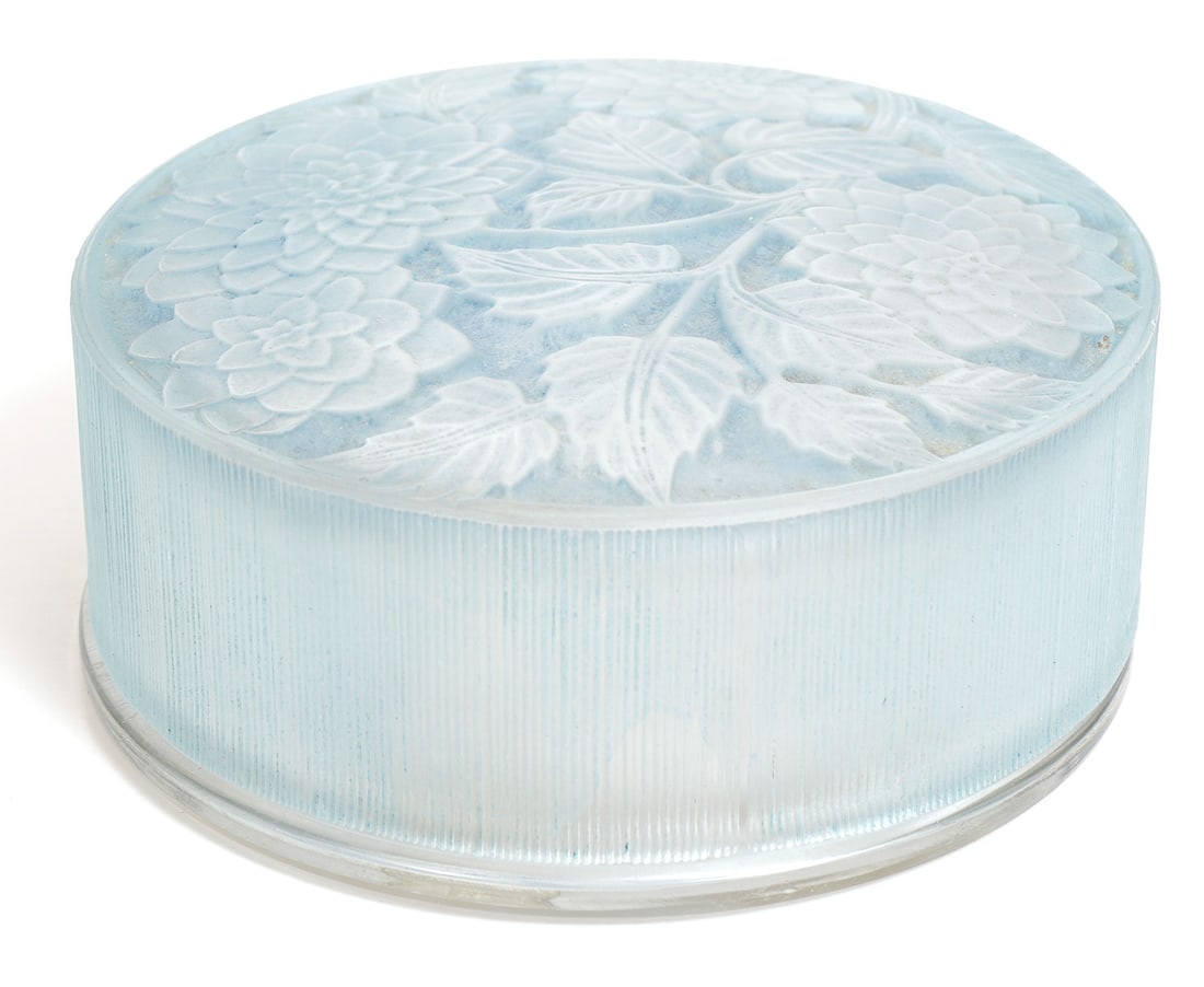 R. Lalique "Meudon" Round Box in Blue Glass: R. Lalique "Meudon" frosted round box in blue patina glass, circa 1924. Measures 1.5"H x 3.5"W. Stamped underside. Condition report: Good condition, please examine all photos closely. Contact C.