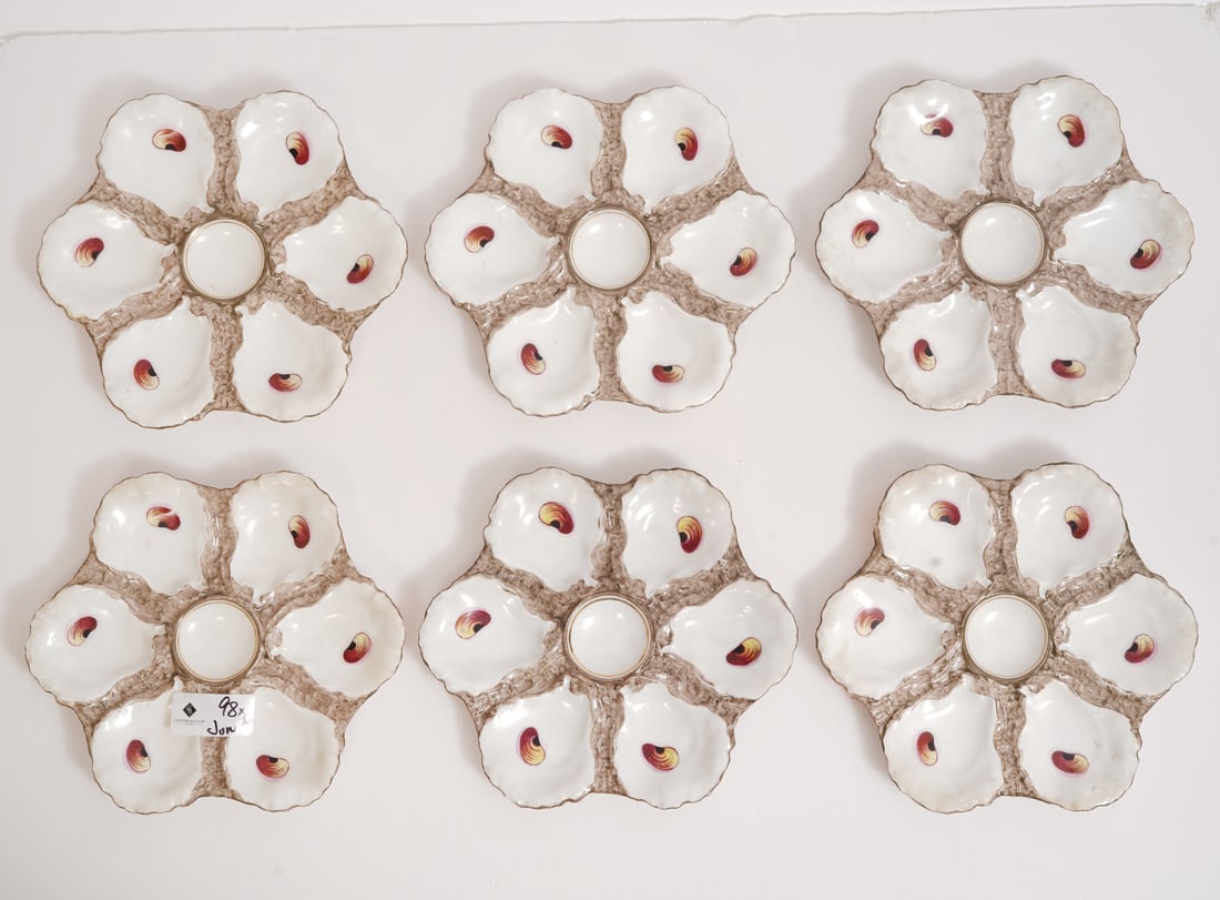 Group of 6 Haviland H&C Limoges Oyster Plates: Group of 6 Haviland H&C Limoges oyster plates, each with six sections and hand-painted details. Measures 9" across. Hallmarked on underside. Condition report: AS-IS condition, various chips throughout