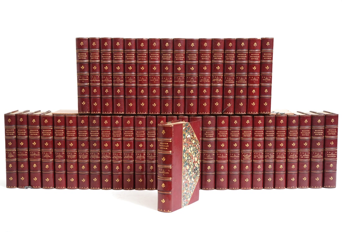 Scott's 'Waverly Novels' 45 Hardcover Volumes: 45 hardcover volumes of Sir Walter Scott's 'Waverly Novels' bound in contemporary half calf, marbled paper over boards, red labels to spine with gilt lettering. Published by Robert Cadell and includes