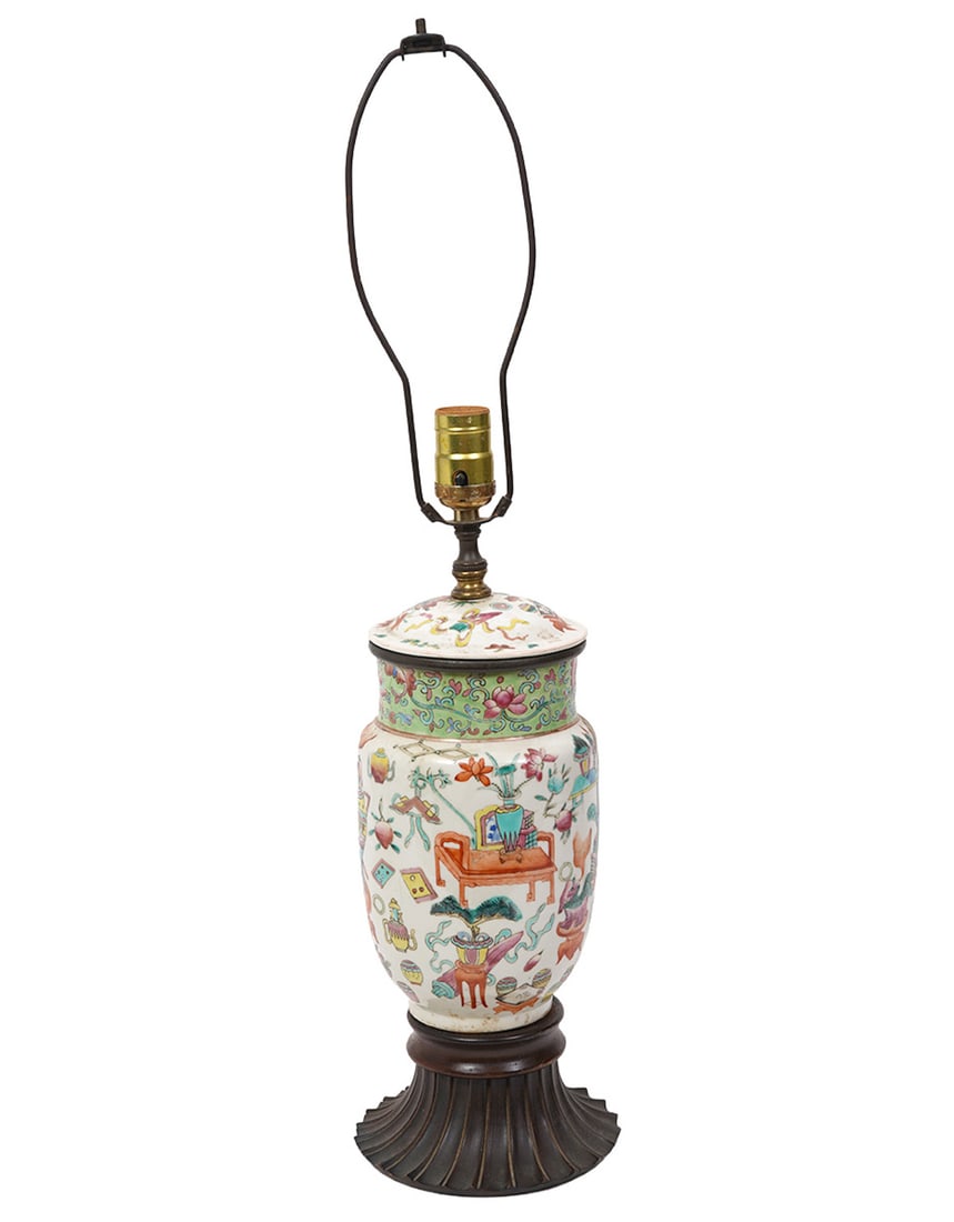 Chinese Temple Jar Table Lamp: Chinese antique temple jar table lamp is mounted on a carved wooden base, converting the decorative jar into a functional lamp and has a single socket. The porcelain vessel is styled in the Famille Ro