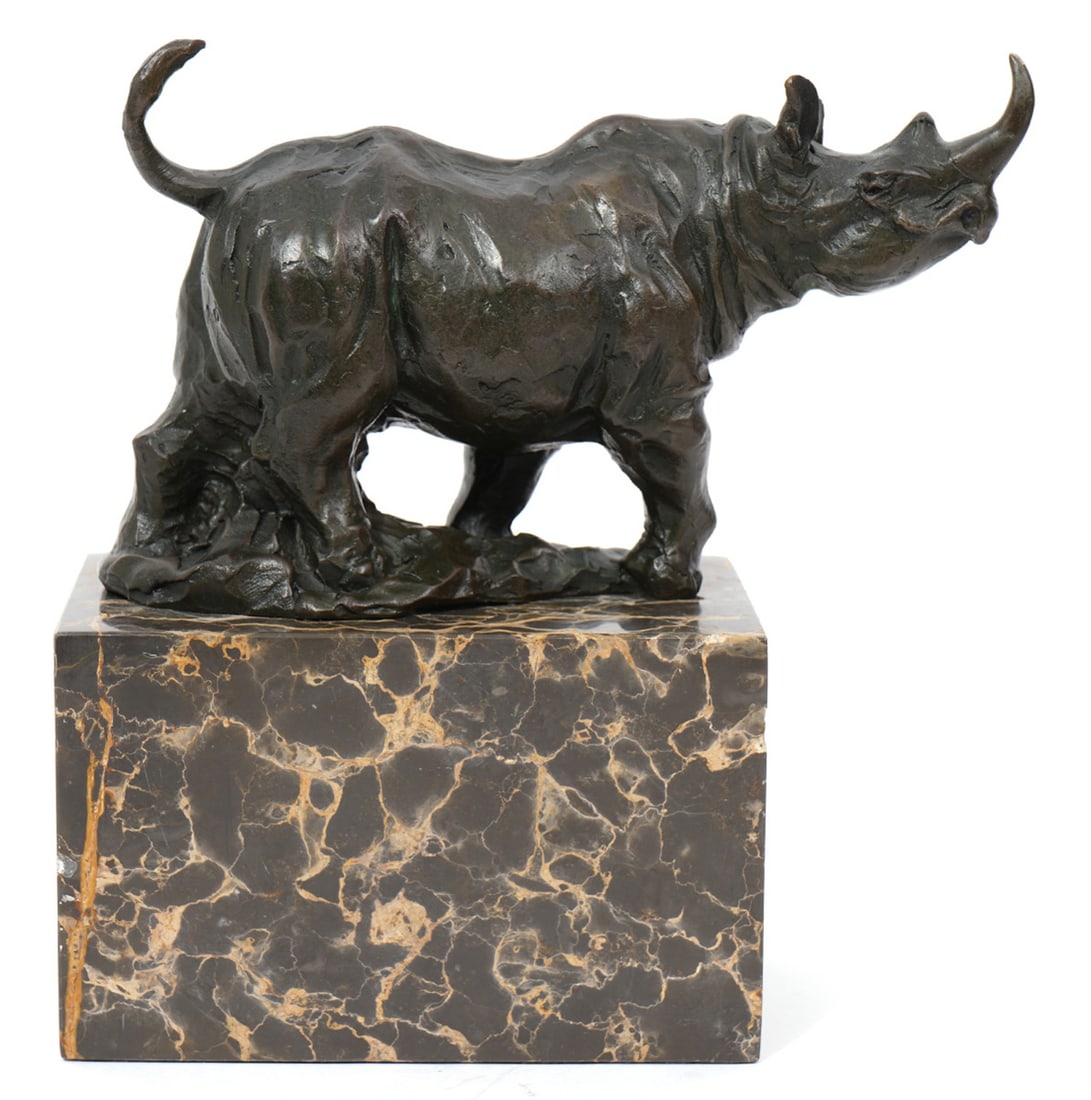 Miguel Fernando Lopez Bronze Garanti Rhino: Miguel Fernando Lopez (Mexican, b. 1955) French bronze Garanti rhino on marble plinth. Stamped and signed "Milo". Overall measures 6.75"L x 3"W x 7.5"H. Condition report: Good condition, please examin