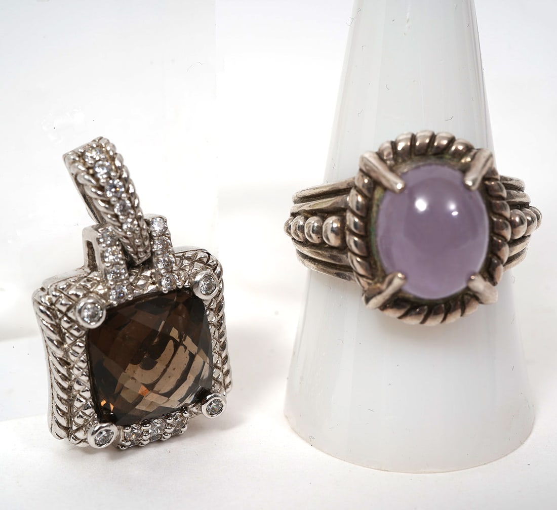 Judith Ripka Sterling Silver Ring and Pendant: Judith Ripka lot includes Square sterling silver pendant with faceted citrine (0.75"); Sterling silver rong with purple stone cabochon, size 9.5. Total weight - 20.8g. Condition report: Good condition
