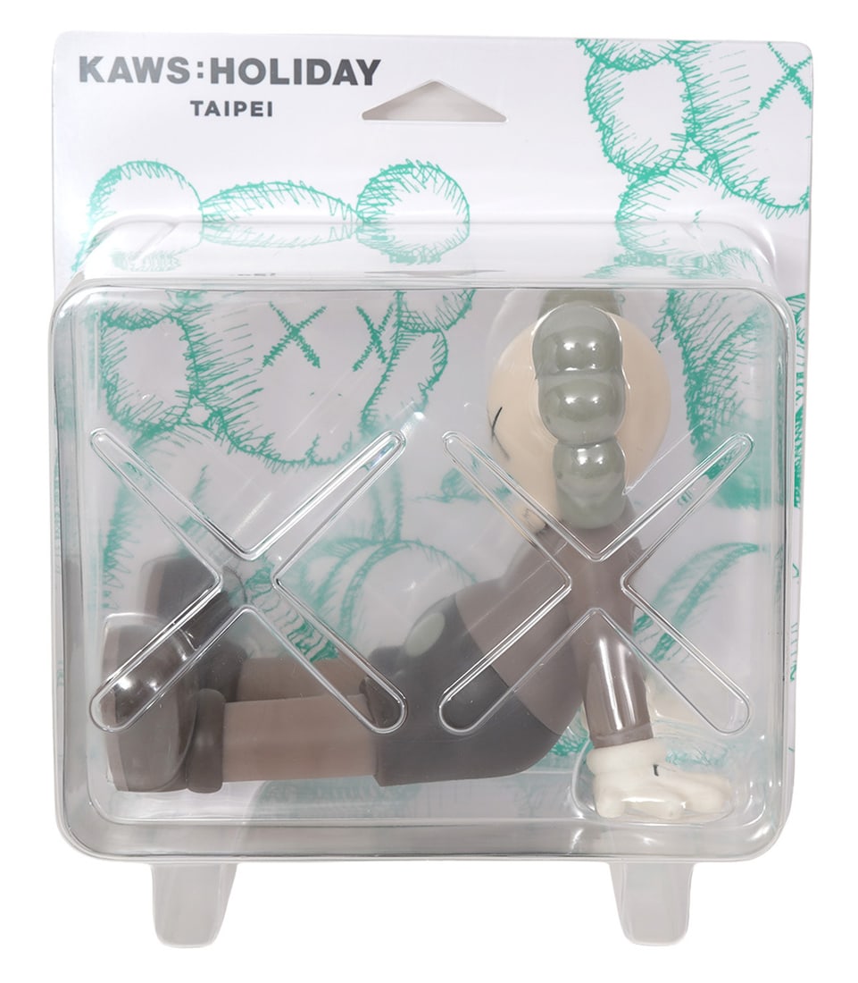 KAWS : HOLIDAY COMPANION FIGURE: KAWS is the signature character of American pop-artist designer Brian Donnelly initially created in 1999. This figure in new and in original packaging. Measures approx. 7"L x 5.5"H (Seated) x 5.5"W. C