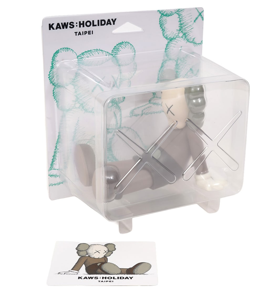 KAWS: HOLIDAY COMPANION FIGURE: KAWS is the signature character of American pop-artist designer Brian Donnelly initially created in 1999. This figure in new and in original packaging. Measures approx. 7"L x 5.5"H (Seated) x 5.5"W. C
