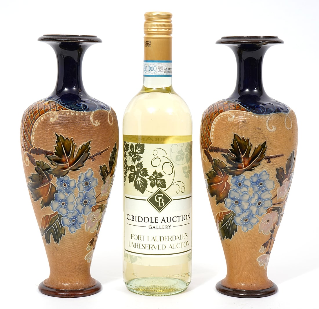 Pr Royal Doulton Art Nouveau Ceramic Vases: Pair of Royal Doulton Art Nouveau ceramic vases with cobalt blue glazed necks and bases. The body below the glaze has a textured fabric-like surface and hand painted floral and leaf motifs. They have 