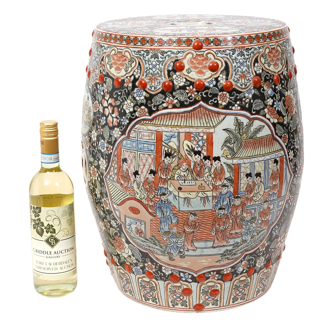 Chinese Porcelain Garden Seat Scholar's Theme: Chinese porcelain garden seat, features famille noir pattern with vignettes of assembled scholars. Floral decoration all around. Measures 17.5"H x 12"W. Condition report: Good condition, please examin