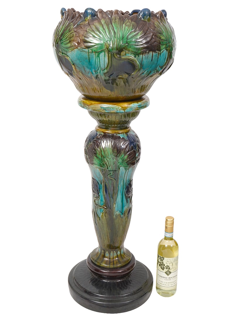 Majolica Planter with Pedestal: Majolica pottery planter with pedestal in green and black marbled glaze. Measurements: Pedestal 28"H x 11"W , Planter 10"H x 14"W. Condition report: Good condition, please examine all photos closely. 