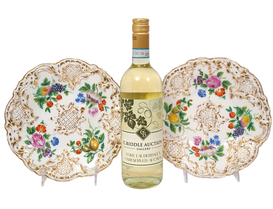 Pair of Meissen Fruit Floral Porcelain Plates: Pair of Meissen raised decoration porcelain plates. Features rocaille, fruit and floral motif. Each measures 9' in diameter. Condition report: Some gilt/paint losses, please examine all photos closely