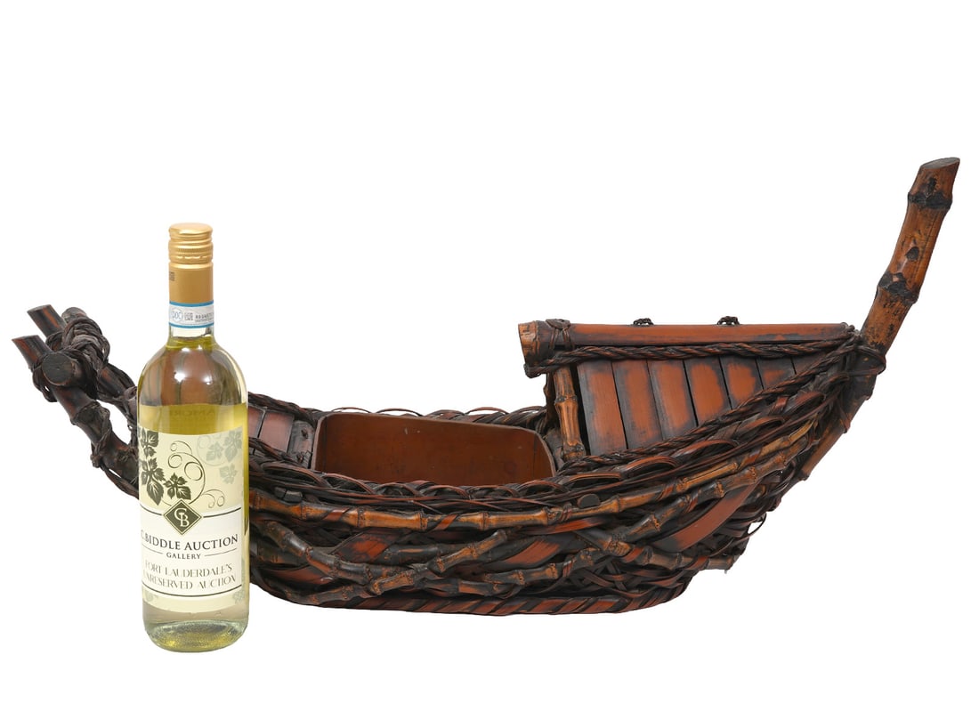 Japanese Figural Boat Ikebana Woven Basket: Large Japanese figural boat Ikebana hand-woven smoked bamboo basket, with metal insert. Measures 28"H x 8"W. Condition report: Good condition, please examine all photos closely. Contact C. Biddle Auct