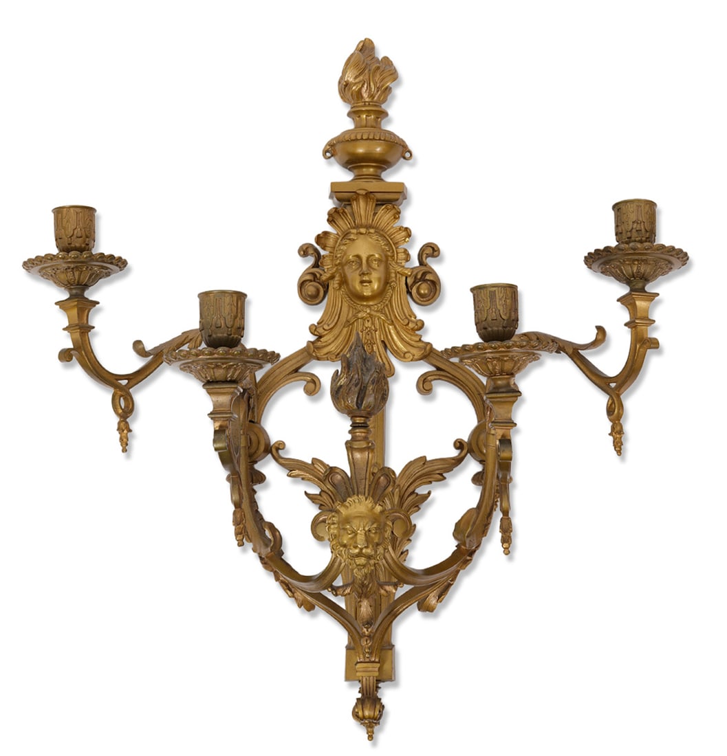 French Neoclassical Style Ormolu Bronze Sconce: French Neoclassical Louis XIV-Style ormolu bronze sconce. Features female goddess face in center, four arms with scrolling acanthus leaves and lion head. Measures 23.5"H x 19"W. Condition report: Good