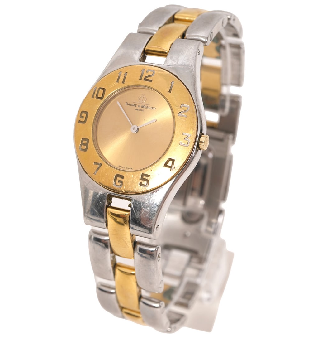 Baume & Mercer "Linea" Stainless Steel Watch: Baume & Mercer "Linea" two-tone stainless steel and gold-plated quartz watch (5161), 29mm case. Condition report: Good condition, please examine all photos closely. Contact C. Biddle Auction Gallery f