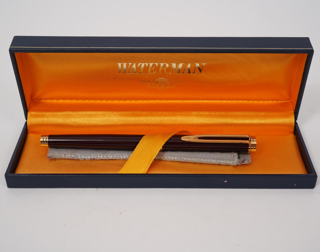 Waterman Burgundy Lacquer 18K Nib Fountain Pen: Waterman "Preface" burgundy lacquer 18K nib fountain pen with original box. Condition report: Good condition, please examine all photos closely. Contact C. Biddle Auction Gallery for more detailed inf