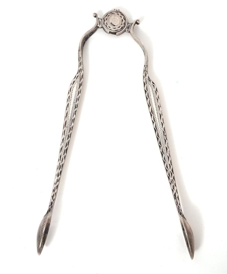 19th C. English Sterling Silver Sugar Tongs: 19th century English sterling silver sugar tongs, with hand-engraved details. Stamped on inside of arm. Weight - 32.9g. and measures approx 6.5" long. Condition report: Good condition, please examine 