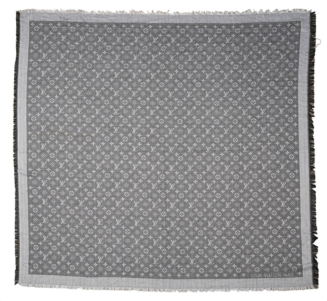 Louis Vuitton Dark Silver Monogram Shine Shawl: Louis Vuitton dark silver monogram shine shawl composed of 50% silk, 30 metal, 20% wool. Measures 140cm x 140cm. Condition report: Very minor stain, at back edge, please examine all photos closely. Co