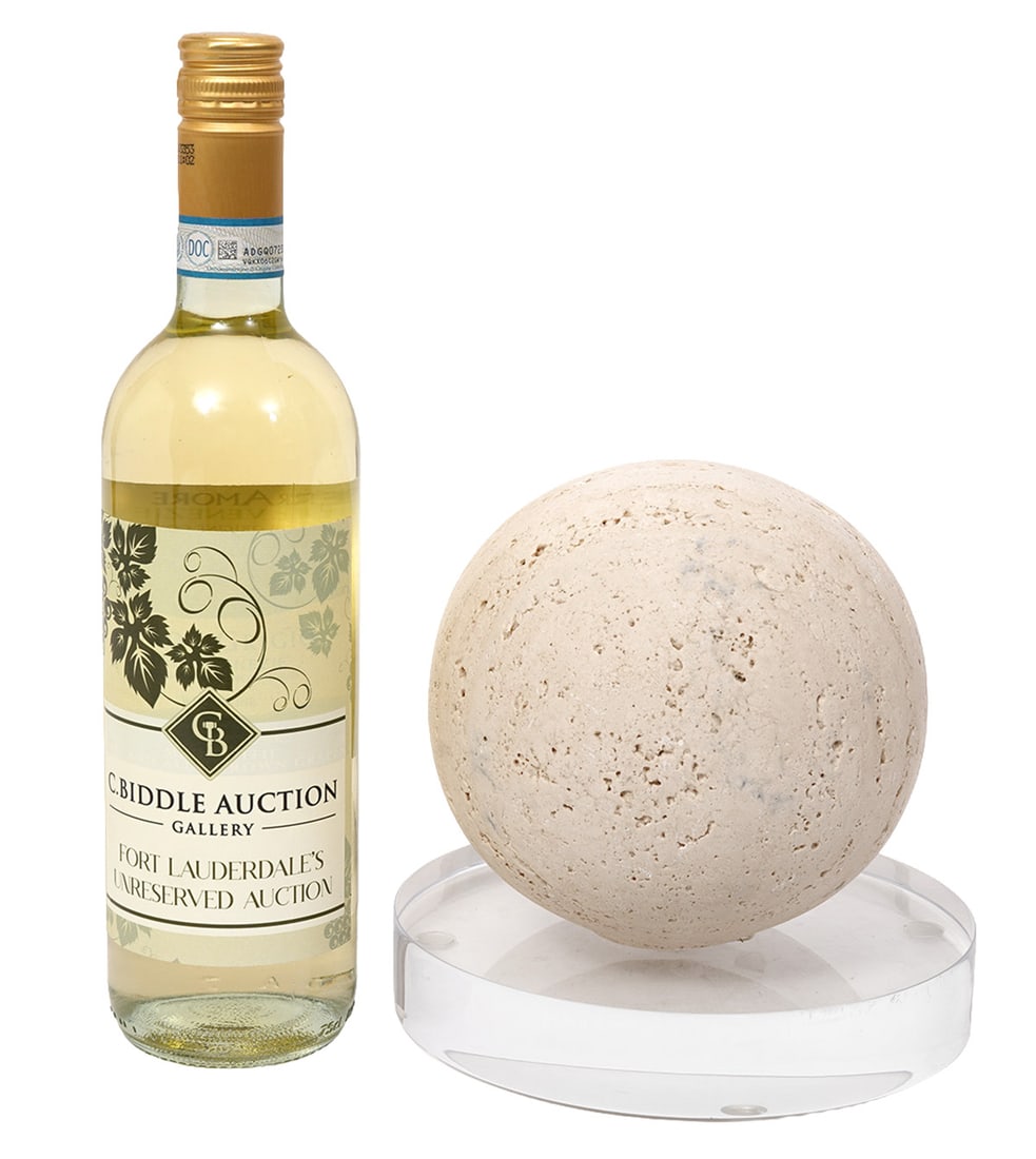 Italian Travertine Stone Sphere on Lucite Base: Italian Travertine stone sphere on lucite base. Sphere measures approximately 5.5" and sits on a 1.5"H x 7"W base. Condition report: Good condition, please examine all photos closely. Contact C. Biddl