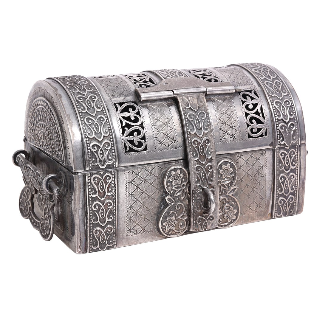Small Oriental Style Silver Domed Chest: Small oriental-style silver domed chest, tested silver, and features repeating scrolling embossed patterns and pierced sections and has swing handles. Measures 5.5"L x 3.5"W x 3"H. Weight - 542.7g. Co