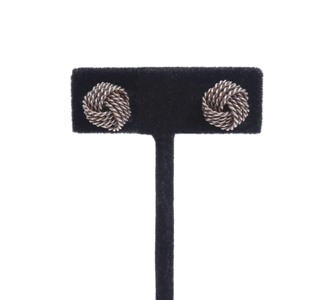 Tiffany & Co. Sterling Silver Knot Earrings: Tiffany & Co. sterling silver knot stud earrings measure approx. 1cm wide and weigh 2.7g. Condition report: Good condition, please examine all photos closely. Contact C. Biddle Auction Gallery for mor
