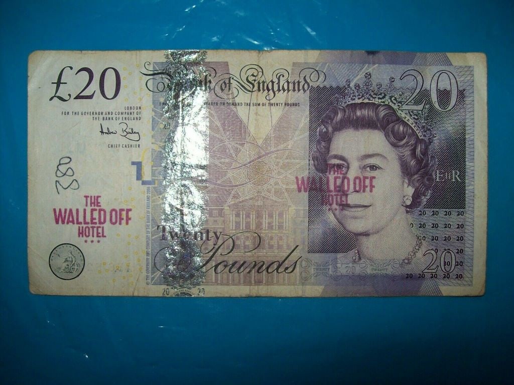 Banksy, (After) pound 20 GBP Walled Off Hotel Bank Note: Banksy After 20 GBP Walled Off Hotel Bank Note 20 GBP Walled Off Hotel Bank Note un signed Walled Off Hotel Stamped 20 GBP banknote Real currency.Used condition.sold in the style of the artist